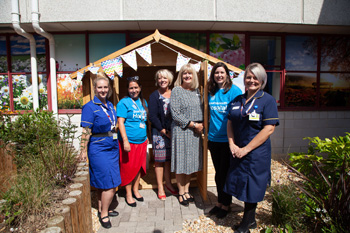 Representatives from Encore Care Homes recently attended a summer garden party at the Royal Bournemouth Hospital to mark the opening of a dementia-friendly summerhouse which they donated to the Bournemouth Hospital Charity.